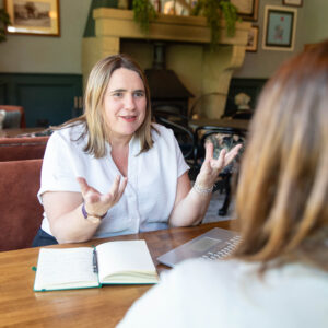 Business consultant Julie Leach helping entrepreneurs streamline operations and reduce overwhelm